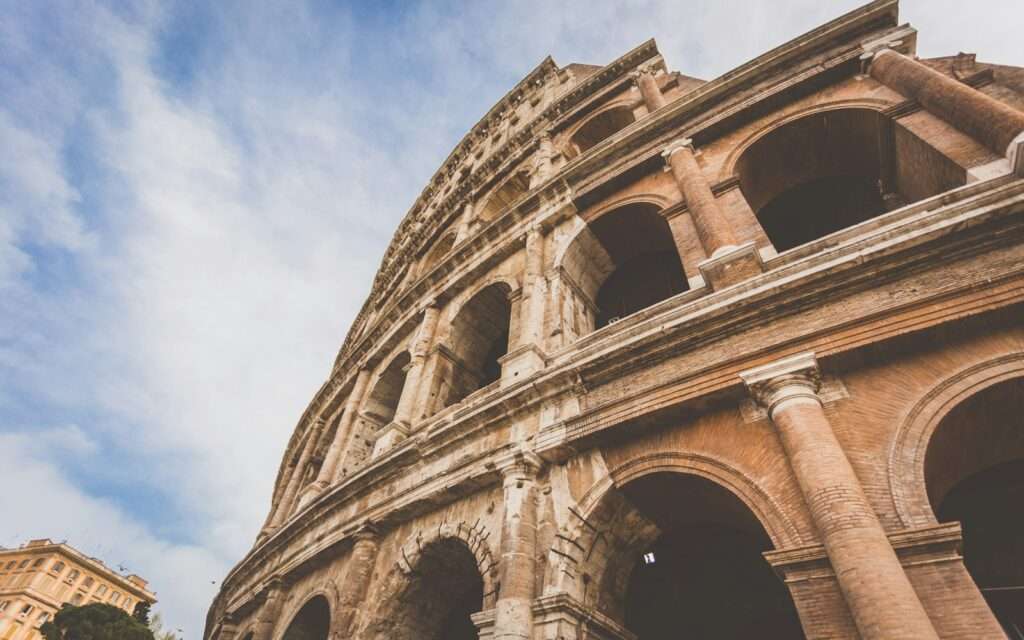 The tiered arches of the Colosseum seen from street level