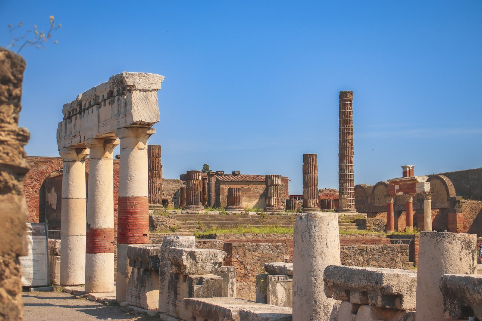Columns of the Forum at Pompeii under a clear sky